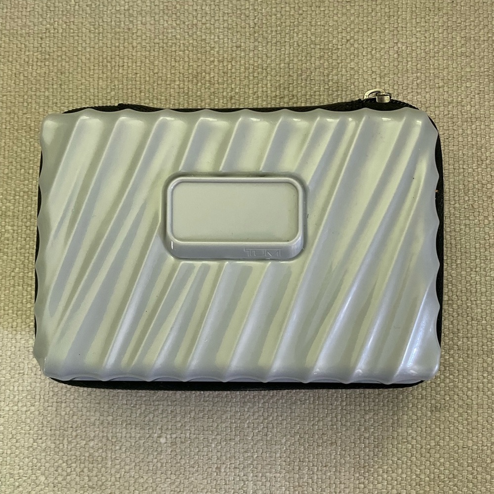 Tumi Silver and Black Travel Case